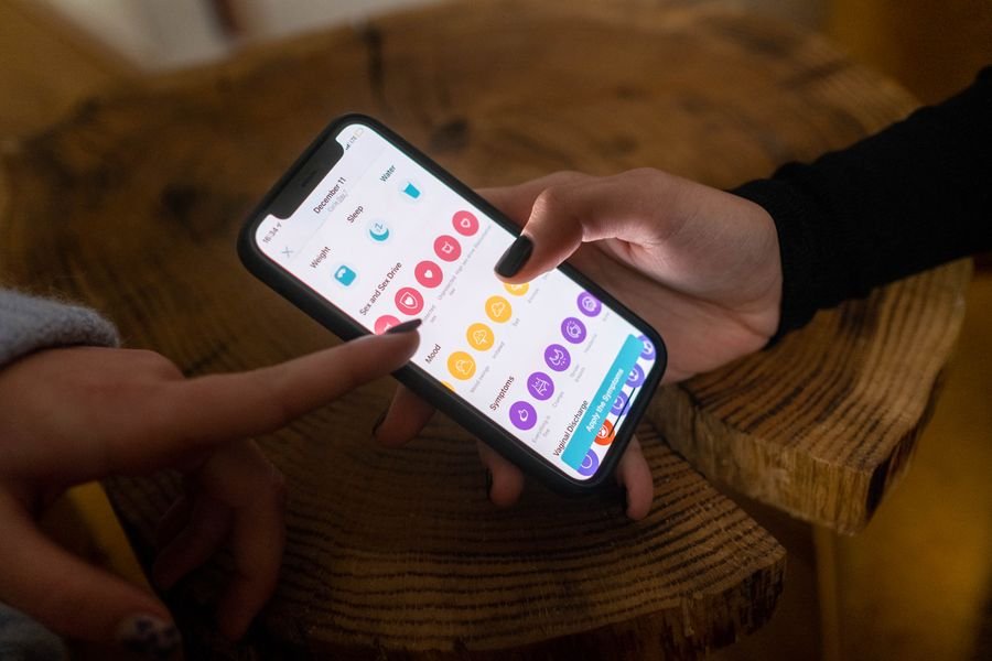 A person using a mobile app on a smartphone